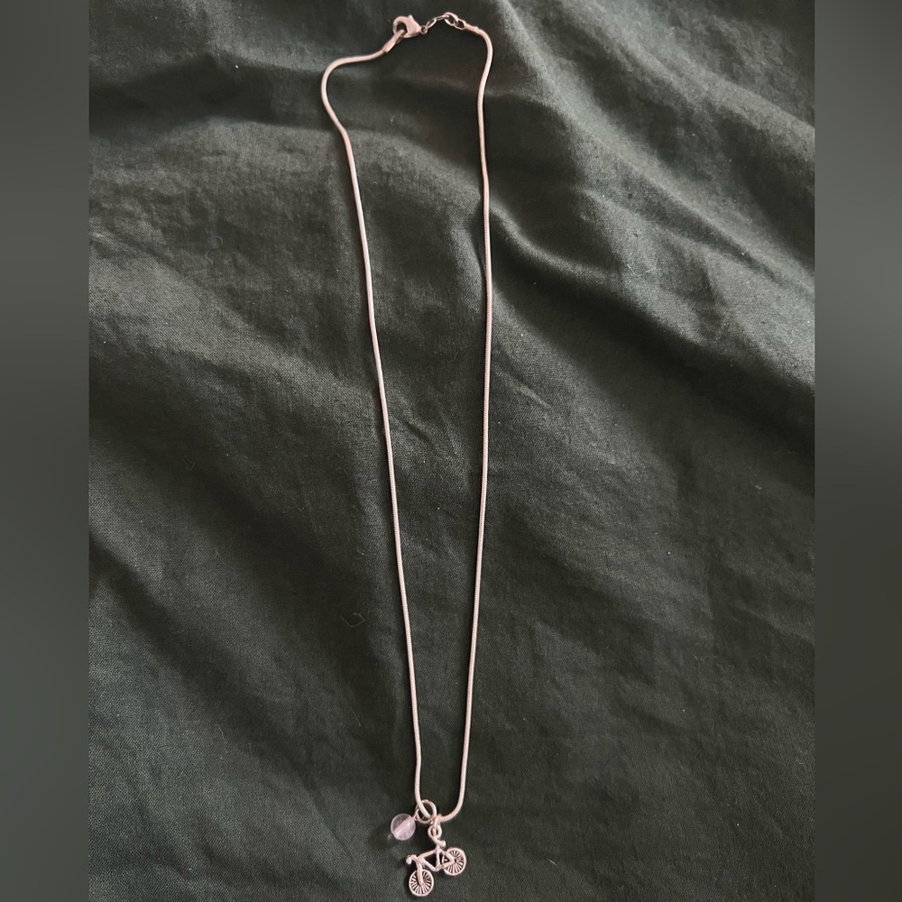 Silver plated Reclaimed Handmade Elephant Pendant & silver bell Necklace.